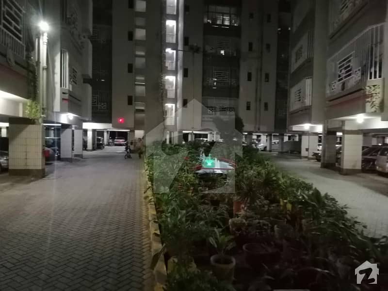 A flat for sale in well maintained apartment MADINA BLESSING in Block