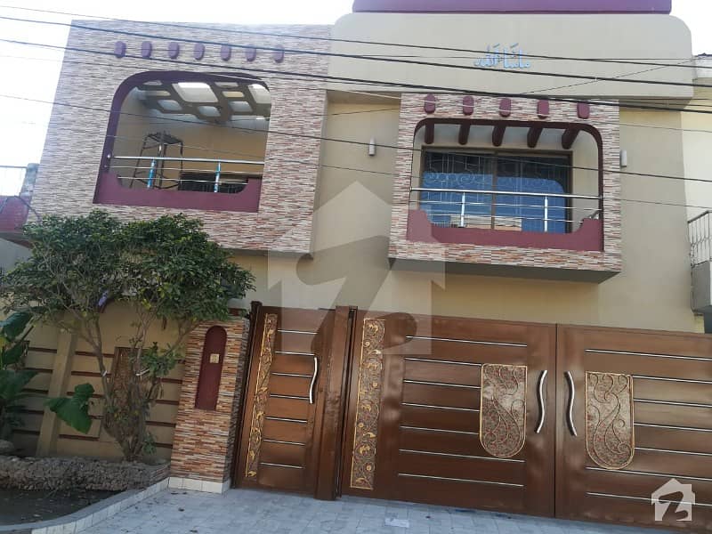 model town ext 10 marla house for sale