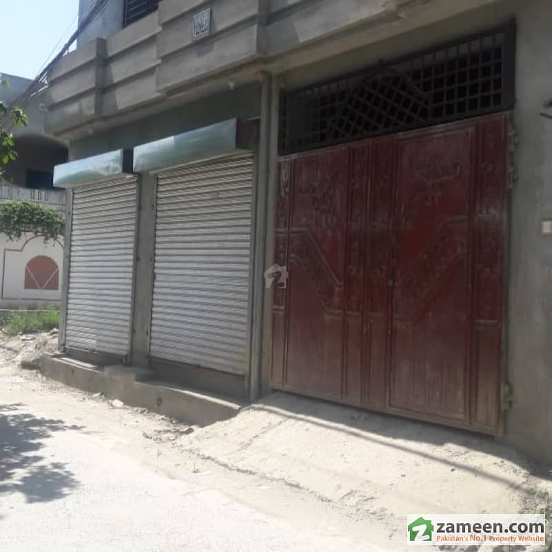 Double Storey House With Shops Is Available For Sale