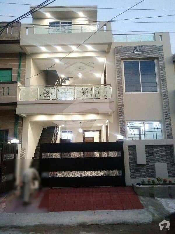 New double story house VIP location VIP wood work main road and masjid sirf ak Call janab Saif Khan Fatima real estate