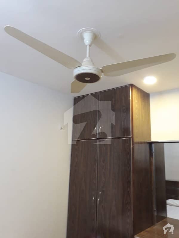 fully furnished and independnet flat with 2 rooms for rent in Q Blcok Model Town Lahore final rent 20000