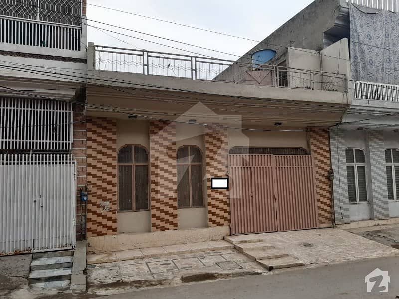 5 MARLA  SINGLE STORY HOUSE FOR SALE AT PRIME LOCATION IN THE CENTER OF LAHORE