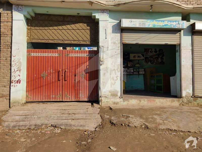 10 Marla Single Storey House With 2 Shops Is Available For Sale In
