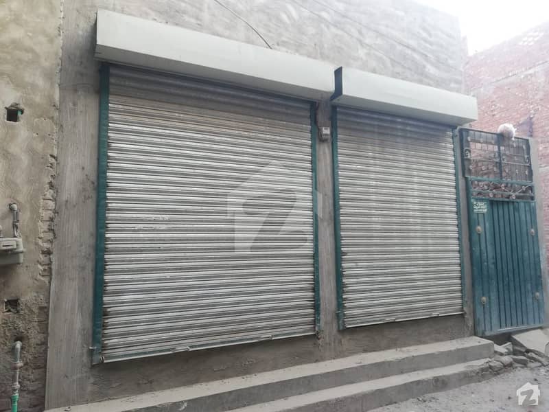 Shop Is Available For Sale With Plot Near Chaman Park