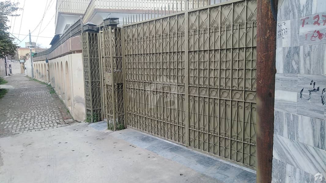 اولڈ باڑہ روڈ پشاور میں 7 کمروں کا 1.5 کنال مکان 5.2 کروڑ میں برائے فروخت۔