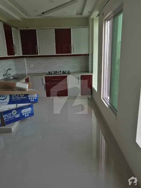 2 BED FLAT WITH TV LOUNGE AVAILABLE IN SECTOR C BAHRIA TOWN LAHORE