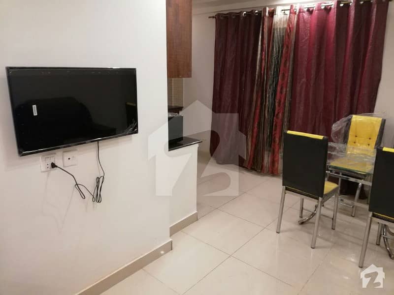 2 BED FURNISHED FLAT WITH TV LOUNGE AVAILABLE IN SECTOR D BAHRIA TOWN LAHORE