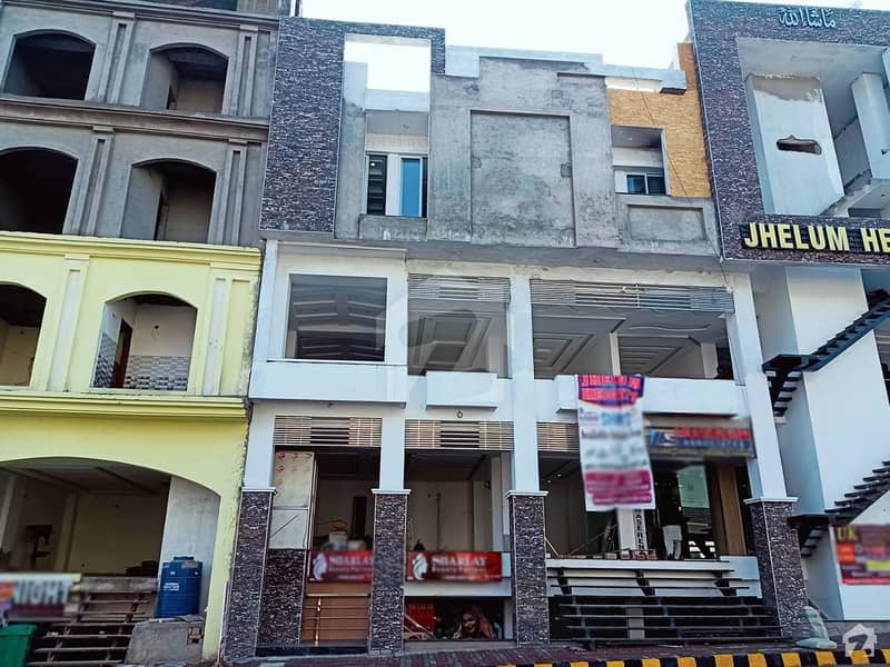 سٹی ہاؤسنگ سکیم جہلم میں 1 مرلہ دکان 80 لاکھ میں برائے فروخت۔
