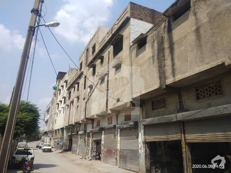 Triple Storey Building including 12 shops  2 Residential Flats