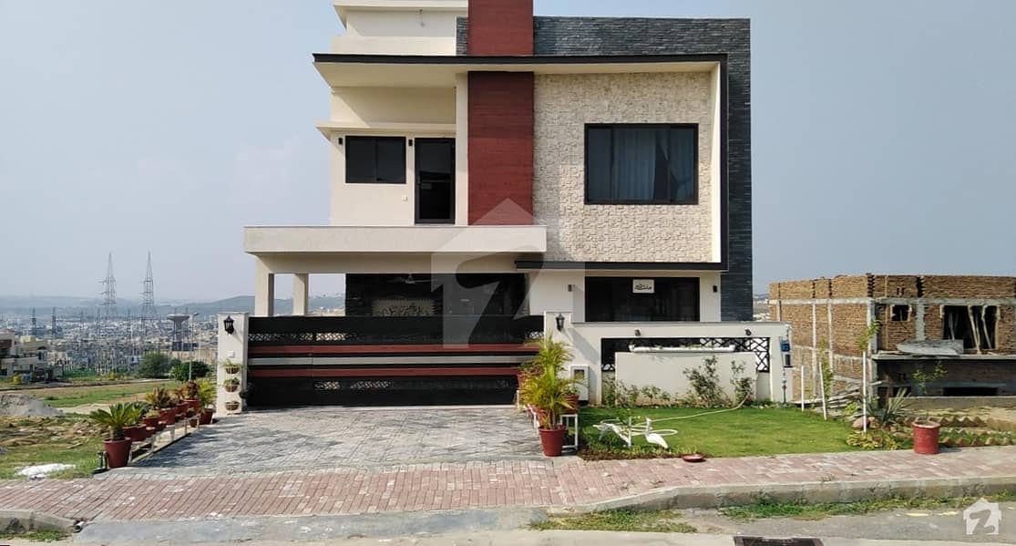 Bahria Town Phase 8 10 marla tripple story designer house for urgent sale out class location