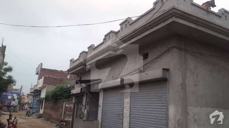8 Marla Corner House With 4 Shops For Sale
