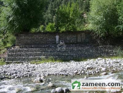 Farm house by the river