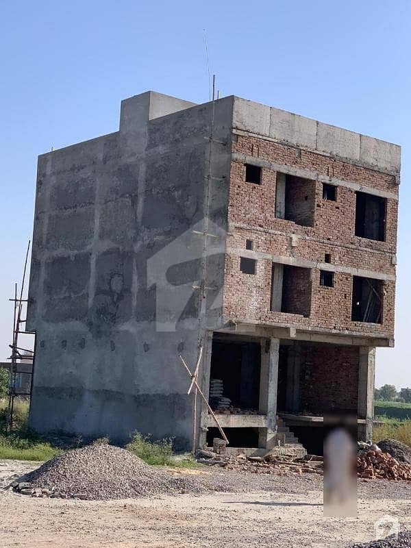 Four Storey Gray Structure Plaza For Sale At Kashmir Highway
